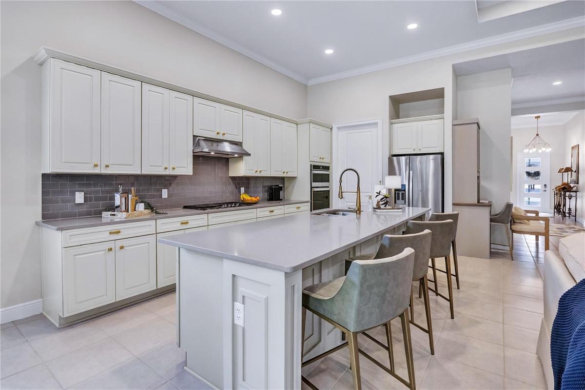 Beautifully appointed kitchen featuring generous counter space and stylish finishes.