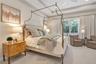Spacious primary retreat offering comfort, elegance, and relaxation.