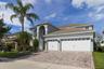With a SCENIC POND VIEW from the front, attractive landscaping and a brick-paver driveway leading to the THREE-CAR GARAGE, this home makes a wonderful