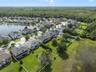 Aerial view of the back of the home and community.