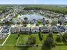 Aerial view of the back of the home and community.