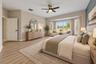 The FIRST-FLOOR PRIMARY SUITE presents a private retreat with LVP FLOORING and a bay window that fills the room with NATURAL LIGHT. Virtually Staged