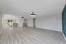 Upstairs, a HUGE LOFT with UPDATED LIGHT/FAN FIXTURES and an accent wall, provides valuable flex space for a media room, game room, home office or add