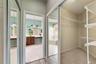 TWO WALK-IN CLOSETS in the Primary Suite provide generous storage.