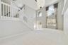 The formal LIVING ROOM/DINING ROOM COMBO share an elegant, open setting enhanced by 2-STORY CEILINGS where a chandelier and decorative ceiling medalli