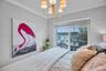 Five-light tiered chandelier with fabric drum shades and crown molding