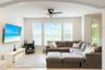 Open-concept room featuring a prominent arched entry, triple window configuration with blinds, ceiling fan, and ceramic tile flooring