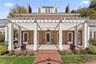 Expansive pergola featuring a retractable roof
