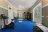 Virtually staged exercise room.