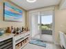 Kitchen opens to Balcony