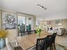 Dining opens to Living room and Balcony