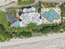 Pool and Spa with walkway to beach. Tennis Courts