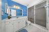 Full bath on same level as pink bath
