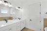 Primary bathroom (representative photo)