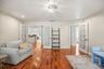 Front family room with French doors opening to the kitchen