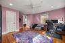Study with closet and wood floors