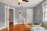 Bedroom with closet and ceiling fan