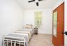 1st. Floor: Room featuring wood-finish flooring, ceiling fan, and window with natural exterior exposure