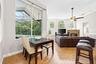 Breakfast nook off the kitchen, open to the family room.