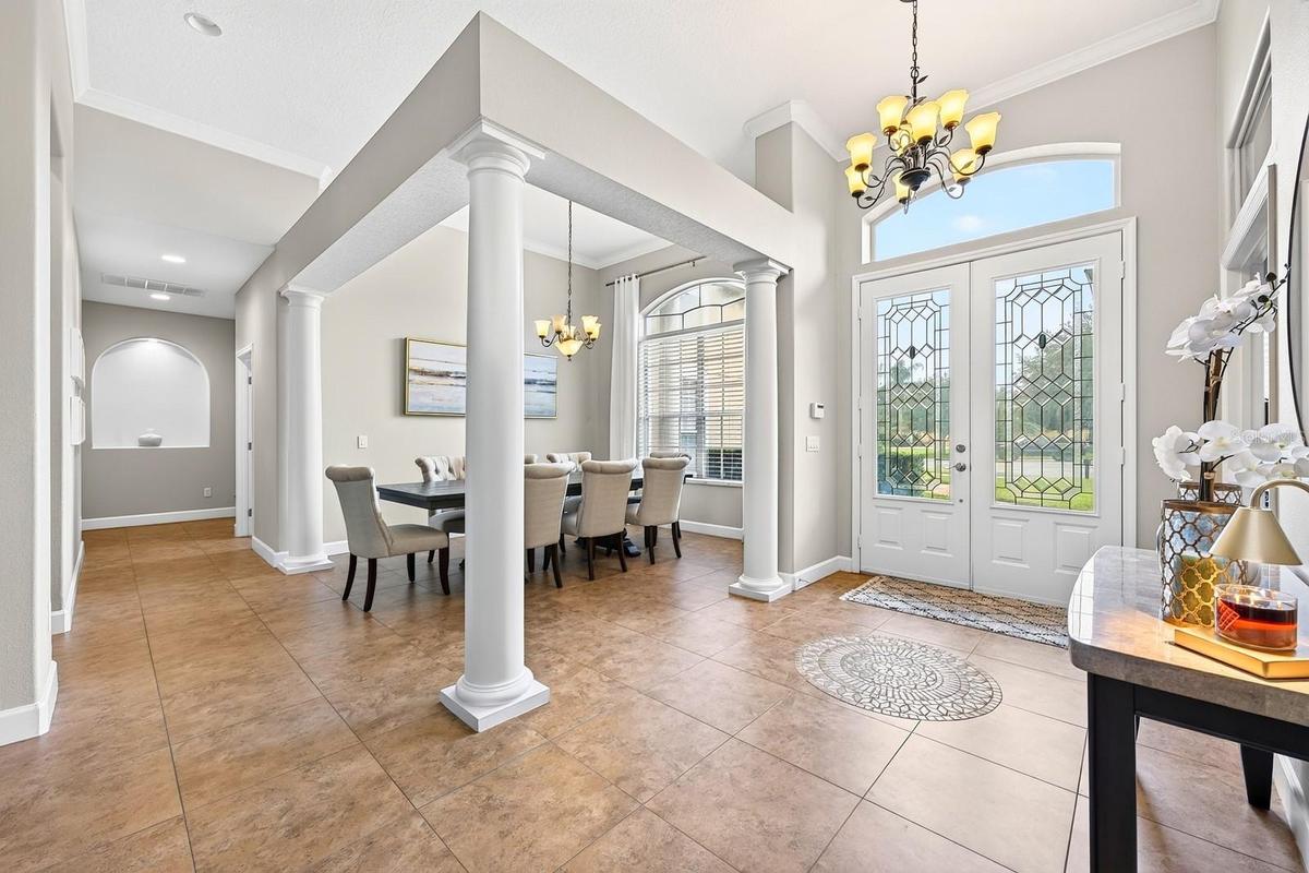 Double entry doors, formal spaces and a dedicated office set the tone for this versatile floor plan.