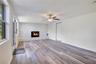 Family room with wood-burning fireplace