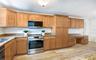 Kitchen with built-in desk area.