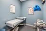 Small room featuring gray-toned wall paint and carpeted flooring