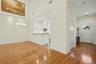 Entrance foyer with coat closet and access to two car garage.