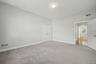 Large second floor bedroom with plenty of closet space.