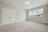 Second floor bedroom with large closet space.