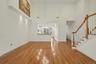 Dining area off kitchen with cathedral ceilings.