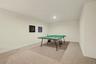 Finished lower level with plenty of room for crafts, games and everyday living.