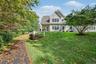 End unit with lovely landscaped backyard.