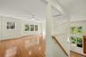 Loft area overlooking living dining area.
