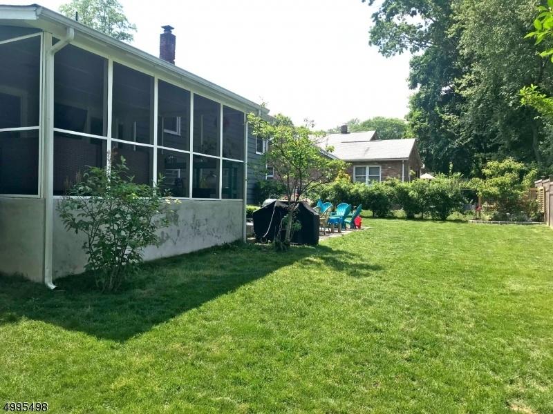 Flat fenced in yard