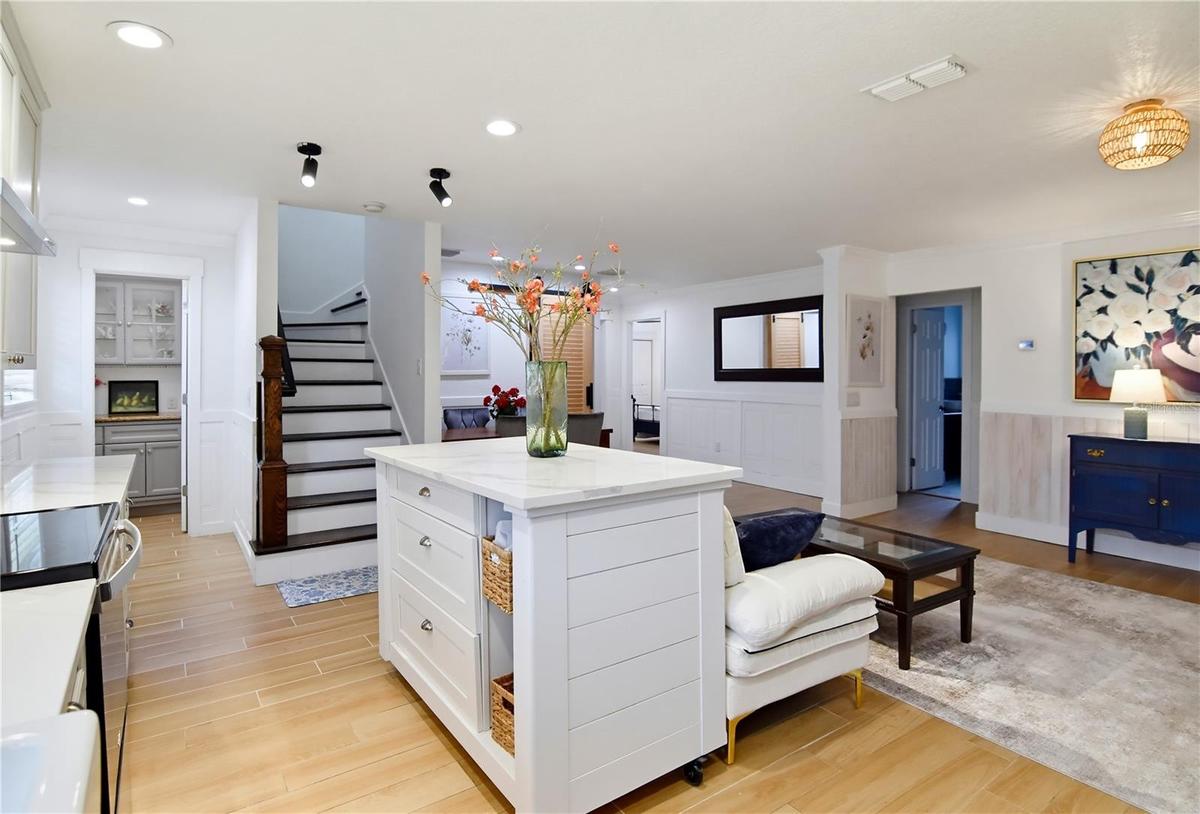 Open living area with abundant natural light and an easy connection to the kitchen and dining room.