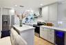 Another view of the beautifully appointed kitchen, designed for everyday convenience and entertaining.
