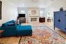 Another view of the family room, showcasing the fireplace and custom built-ins.