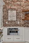 The chef's kitchen is a true focal point with a distinctive mix of old-world charm and modern design that combine luxury and function