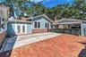 A private courtyard offers space for recreation or an extension of outdoor living.