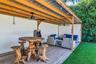 Detached Covered Lanai creates an expansive and inviting space to enjoy Florida living year round