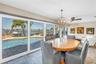Dining Area with View of Pool and Water