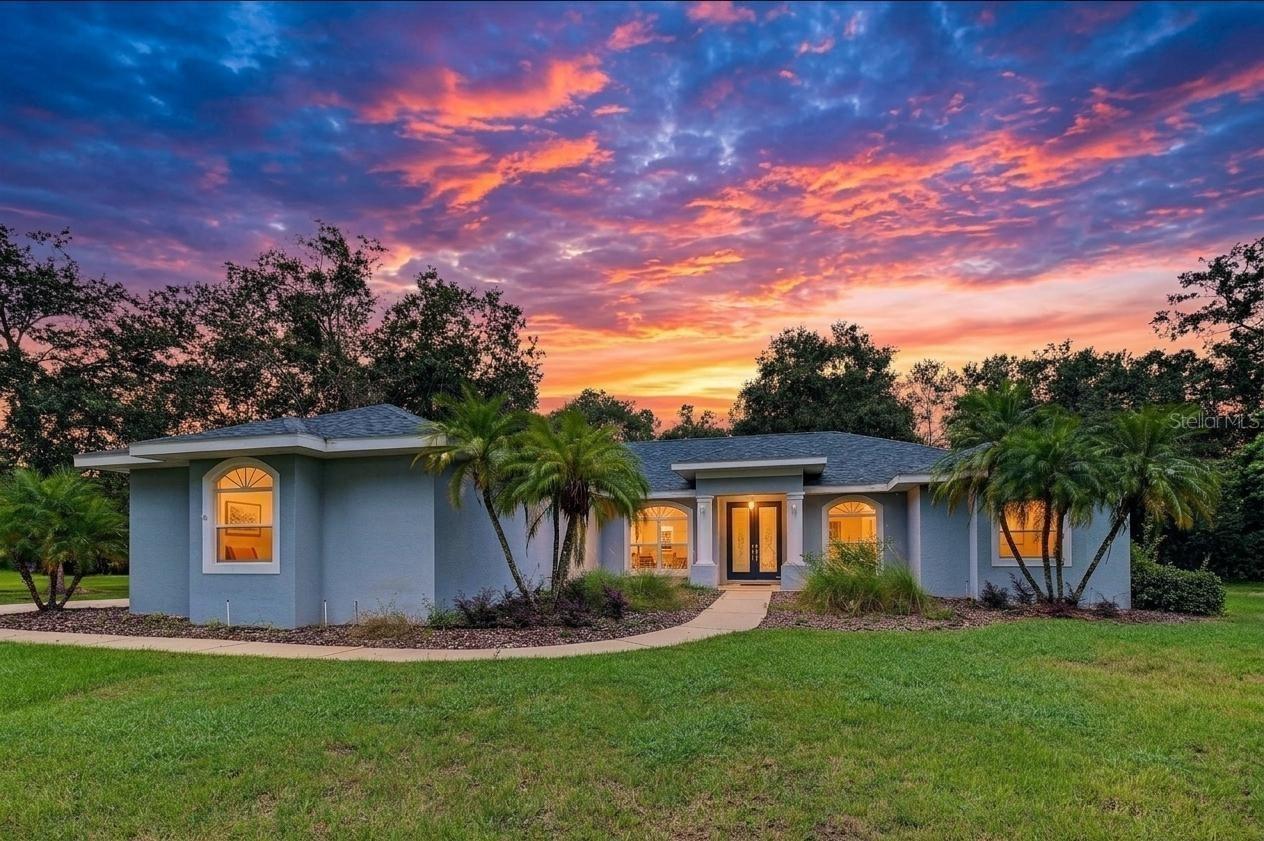 Very Private 3 Bedrooms/3 Bathrooms/3 Car Garage and an office on 1.36 acres!