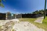 Vacant lot access facing Voorhis