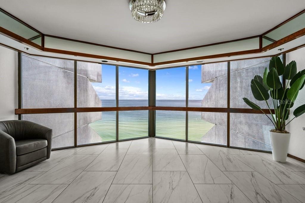 Floor 7 elevator foyer overlooking the sand and water,