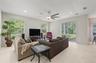 Oversized Family Room, with new ceiling fan and sliding doors to the back yard.