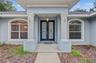 Front Exterior - 3 bedrooms/3 bathrooms/3 car garage and an office which can be another bedroom.