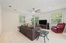 Oversized Family Room, with new ceiling fan and sliding doors to the back yard.