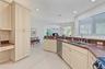 Open Kitchen to the Living Room and Family Room, stainless steel appliances.
