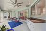 Back Porch with new ceiling fans - French doors off of the master Bedroom